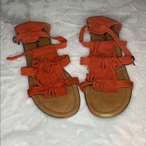 Minnetonka Coral Fringe Sandals